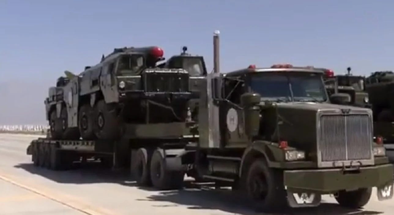 A picture containing truck, sky, road, outdoor

Description automatically generated