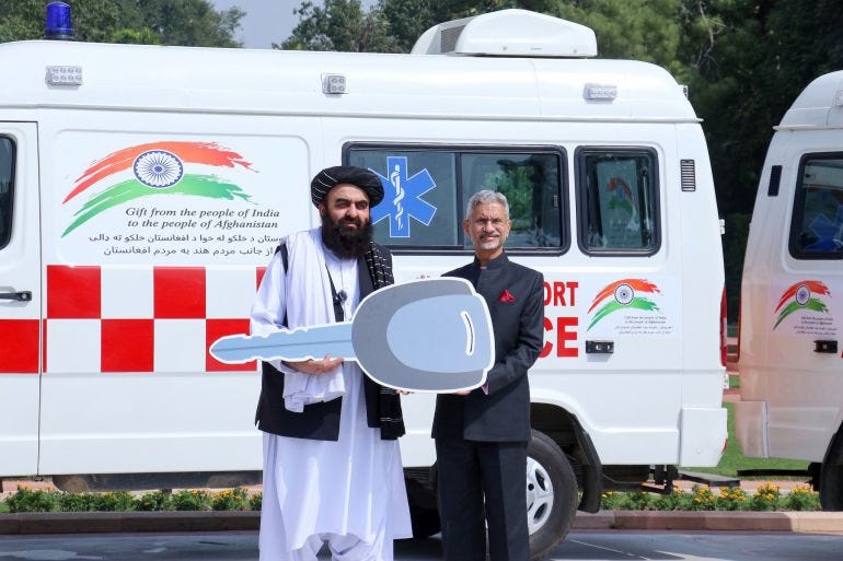 Indian External Affairs Minister S Jaishankar handing over a symbolic key after making a gift of ambulances to Afghan Foreign Minister Amir Khan Muttaqi.