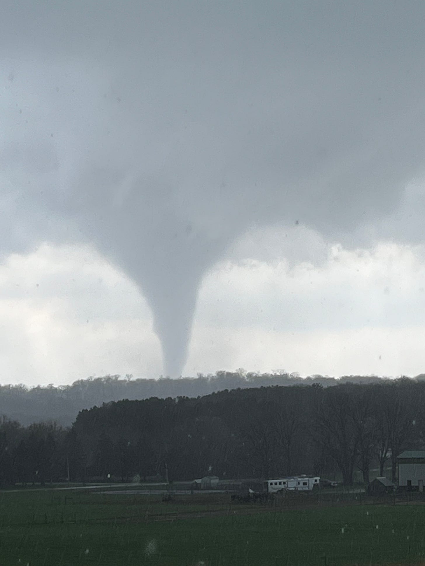 picture of a tornado in the distance 