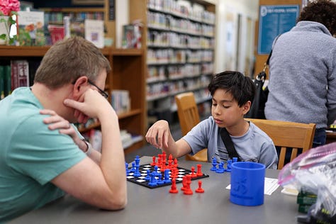 Nine square images from STEM Day, including two students 3d designing, a student sharing his Mars Rover Scratch game, a little kid building with MOLA kit, 3D-Click activities, Tiny robots!, Exploring resources