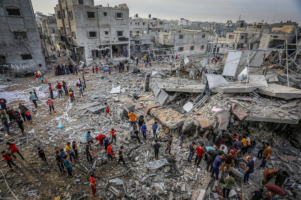 Palestinians at the rubble of a building destroyed by Israeli airstrikes in Rafah, southern Gaza Strip, November 11, 2023. (Abed Rahim Khatib/Flash90) Palestinians at the rubble of a building destroyed by Israeli airstrikes in Rafah, southern Gaza Strip, November 11, 2023. (Abed Rahim Khatib/Flash90)