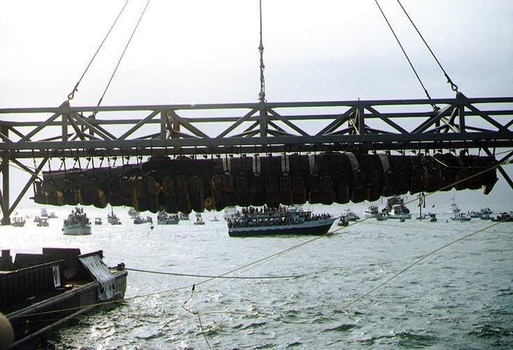 The Confederate submarine H. L. Hunley being recovered off Charleston Harbor on August 8, 2000, 136 years after its sinking. The Confederate submarine H. L. Hunley being recovered off Charleston Harbor on August 8, 2000, 136 years after its sinking.