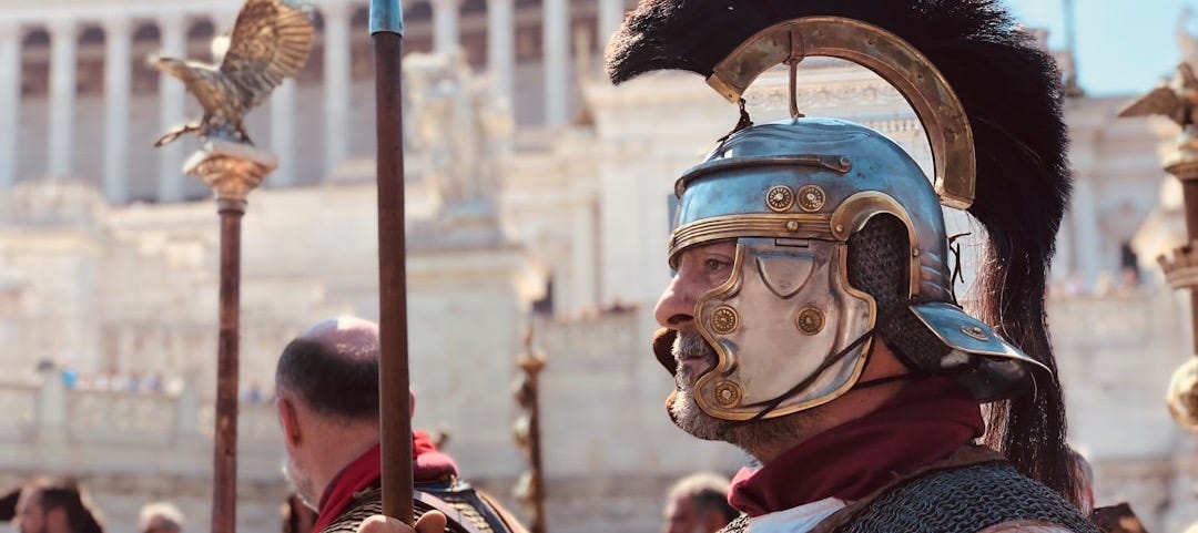 people wearing medieval costumes during day
