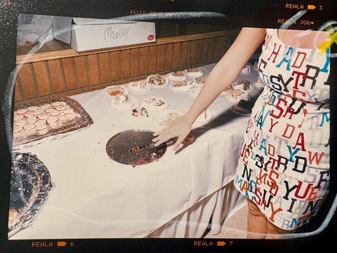 Analog photos of cakes at weddings by Angela Cappetta.