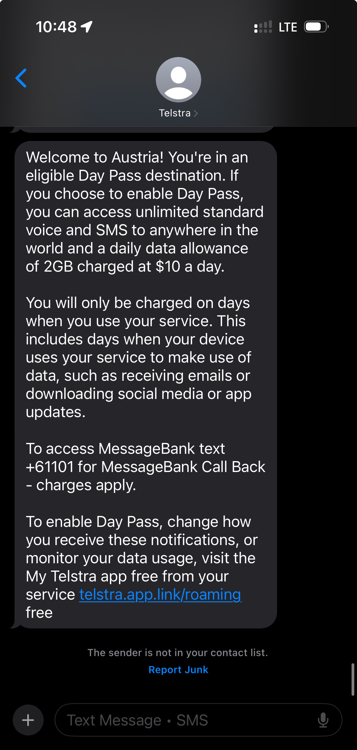 Screenshot of a text from a mobile service provider saying "welcome to Austria!" and with details of purchasing a roaming day pass