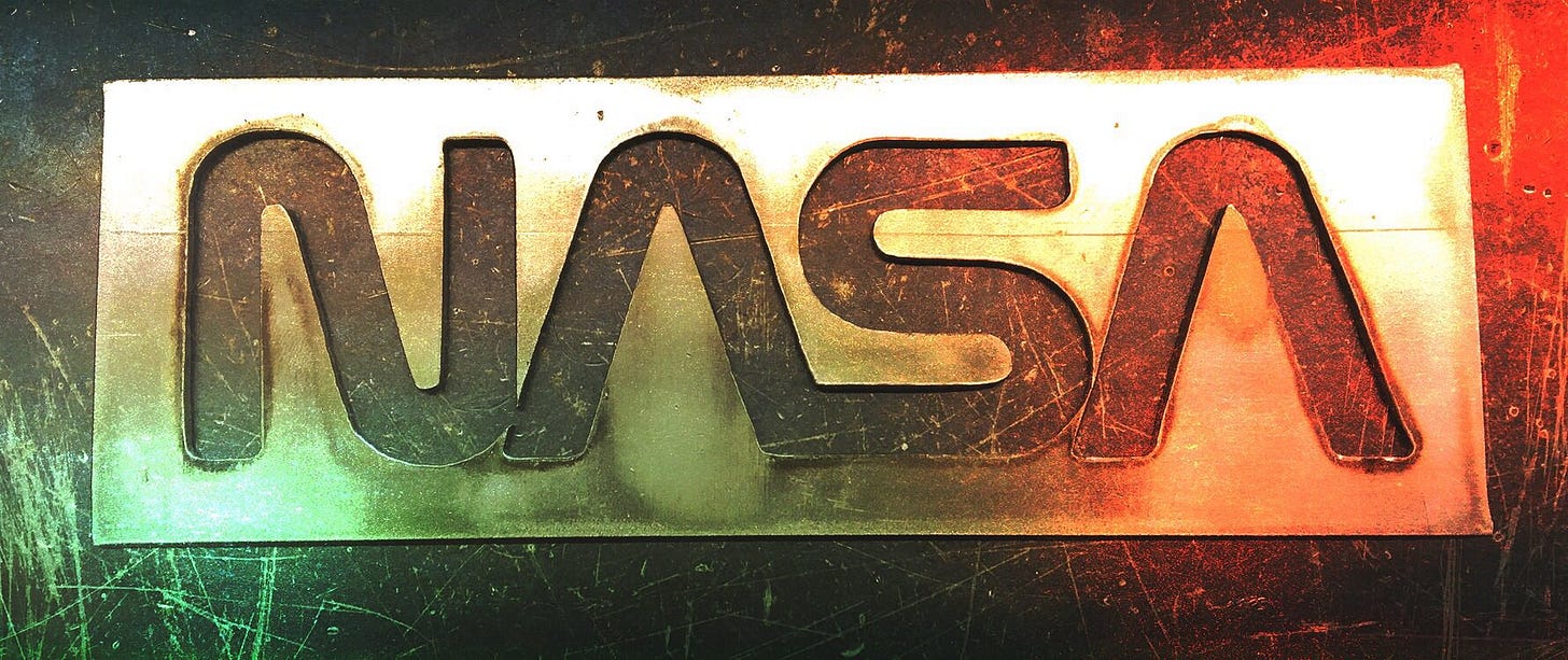 A laser-cut NASA worm logo in steel (my son made it in metalwork at school)