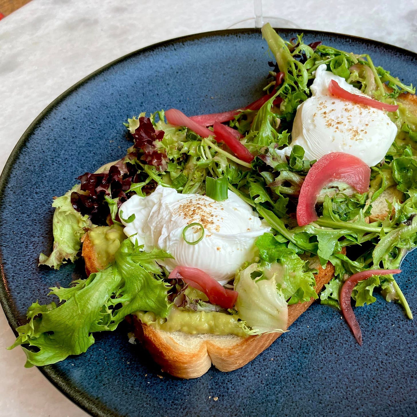 May be an image of poached egg and egg yolk May be an image of poached egg and egg yolk