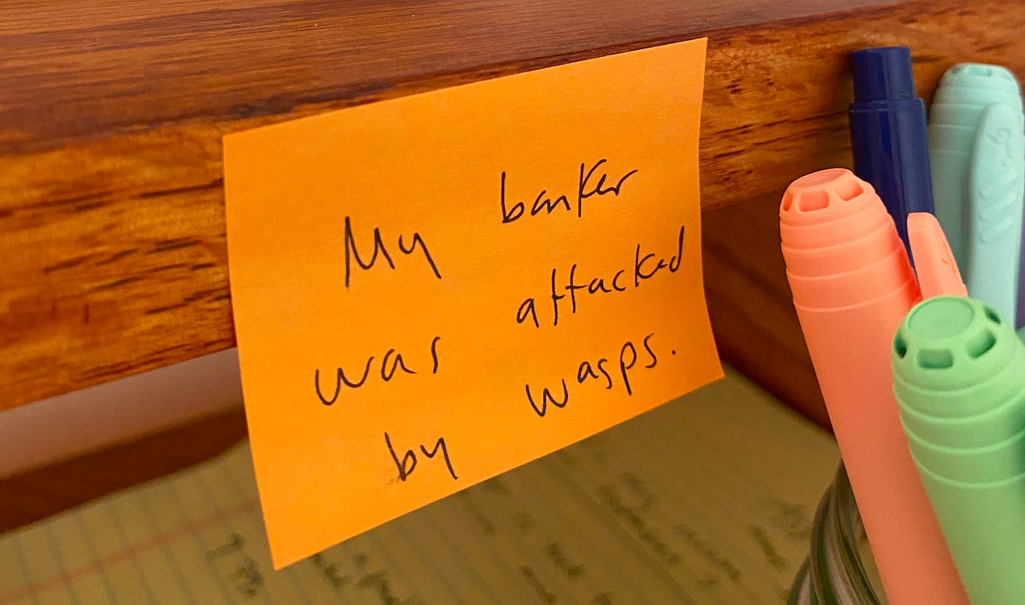 Picture of a sticky note that reads "My banker was attacked by wasps." 