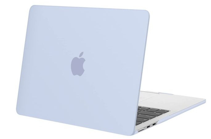 This may contain: an open laptop computer sitting on top of a white surface
