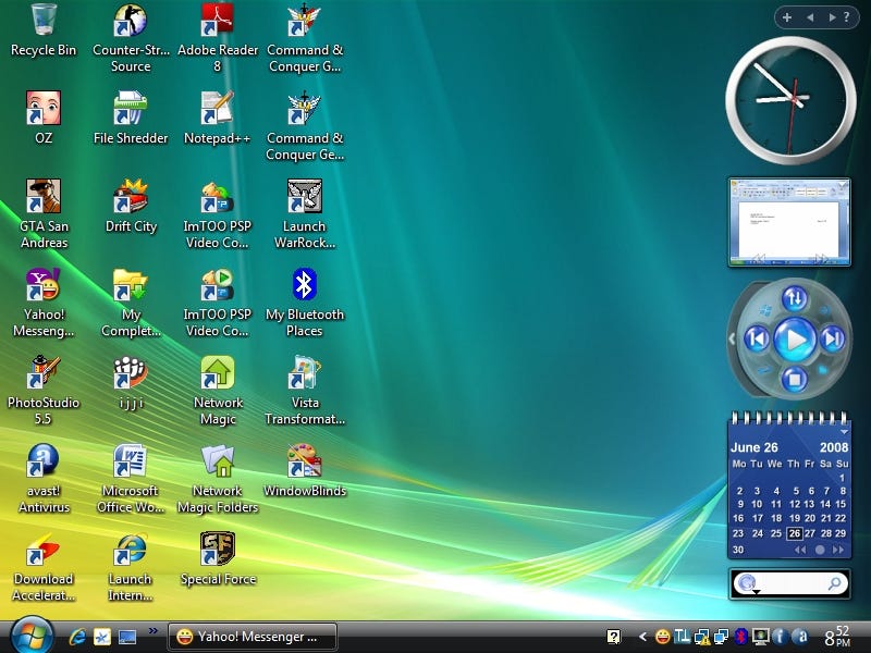 Screenshot of Windows Vista desktop cluttered with apps and a heavy widget sidebar Screenshot of Windows Vista desktop cluttered with apps and a heavy widget sidebar