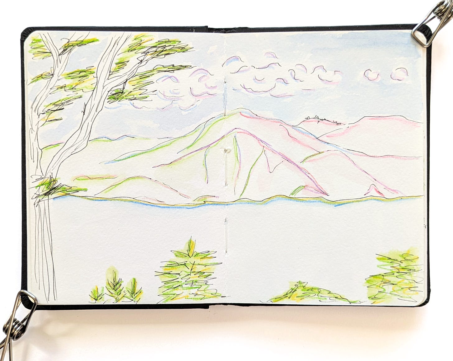 Sketchbook with a drawing of a view from The Legion of Honor. Colored sparingly with watercolor pencils in colors inspired by Wayne Thiebaud.