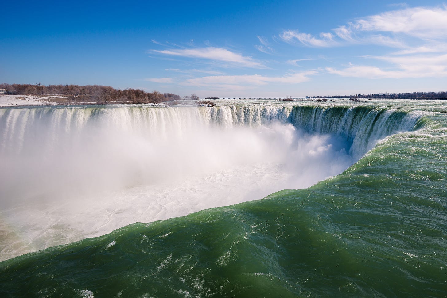 A large waterfall shaped like a horseshoe.