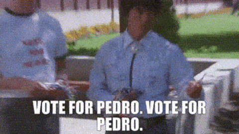 GIF from Napoleon Dynamite (2004): The main character repeatedly chants “Vote for Pedro” while handing out flyers to passing students on their way into school.