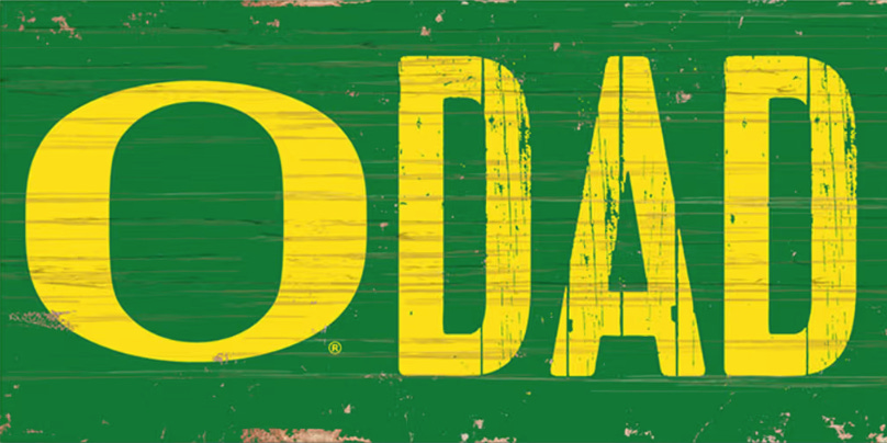 Vintage-style green and yellow 'O DAD' sign featuring the classic Oregon Ducks 'O' logo and bold distressed lettering — perfect gift idea for Oregon football dads and superfans.
