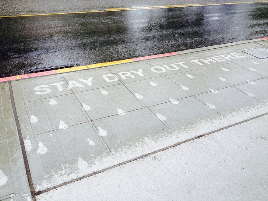 super-hydrophobic-wet-sidewalk-rain-street-art-rainworks-peregrine-church-2