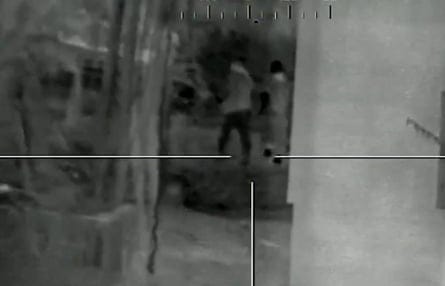 Black and white image of a figure in the crosshairs