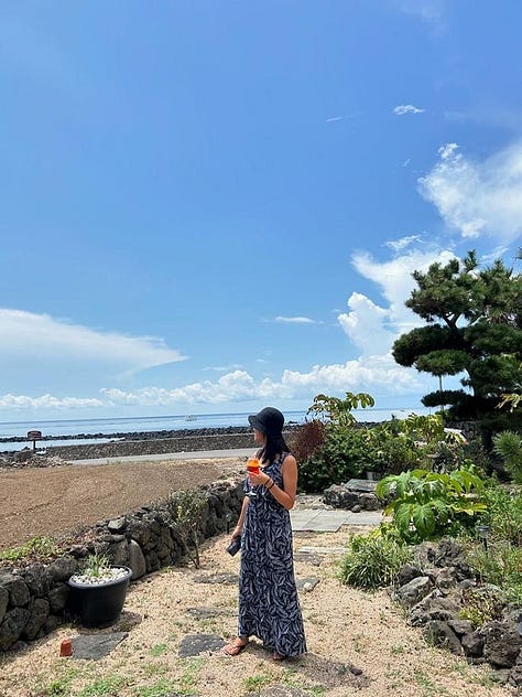 "Mayor" Jenna around some of her favorite locations in Korea including at the base of Sanbang Mountain, overlooking wild flowers in Seoul, looking out into the ocean, and looking down at a traditional Korean seafood meal in Mokpo, the city where she was borh