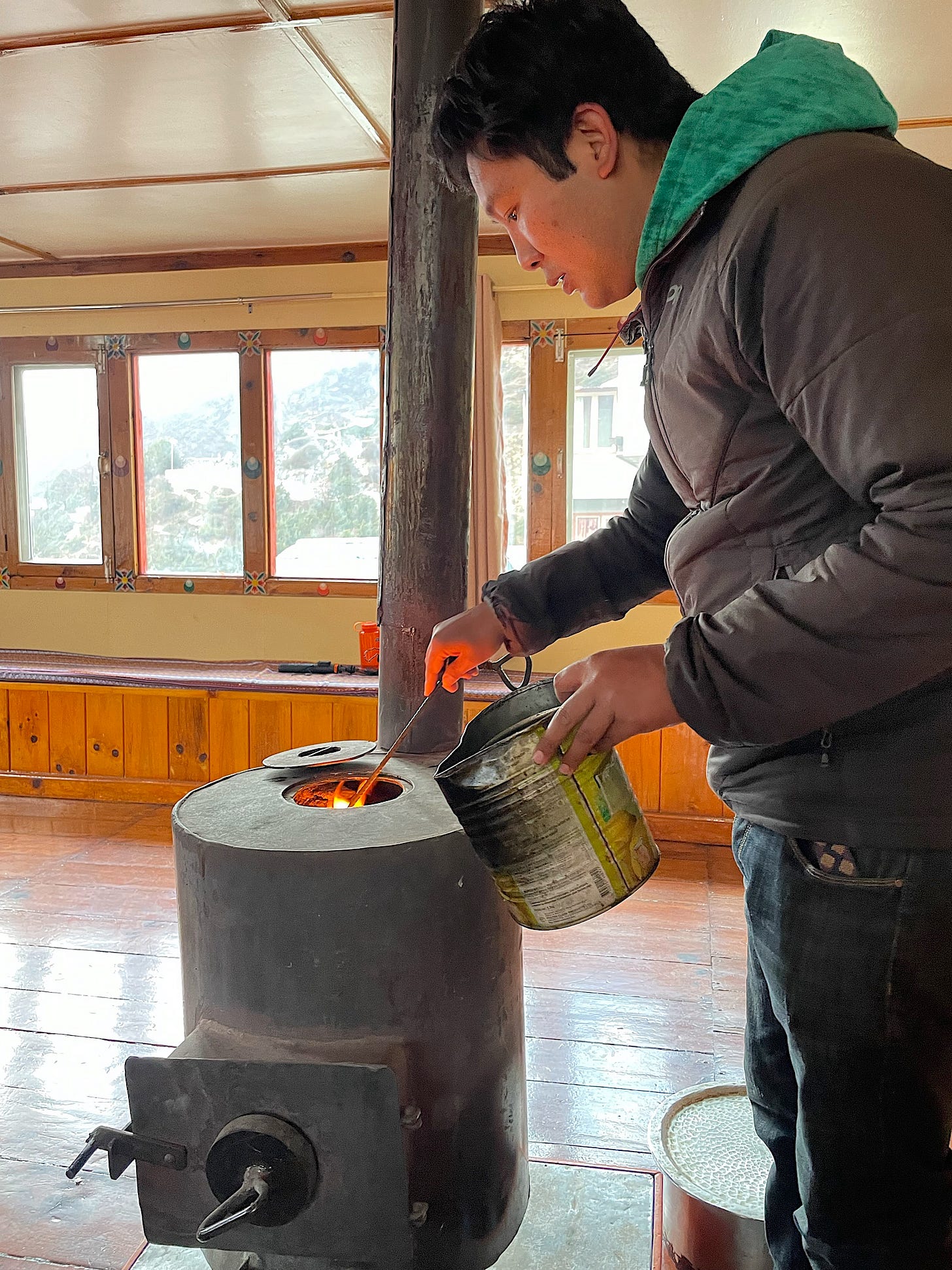 Custom is to pour kerosene or lighter fluid or something onto the dung to help it ignite.