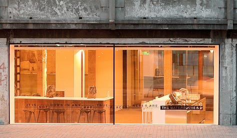 Neri&Hu — The Waterhouse at South Bund, Shanghai. Former 1930s Japanese army headquarters converted into a boutique hotel. Raw concrete, preserved industrial structure, and original markings held deliberately as identity rather than erased.