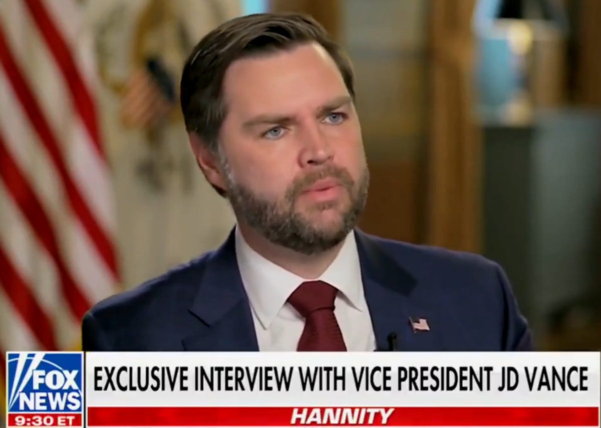 JD vance speaking with a Vox News chyron at the bottom