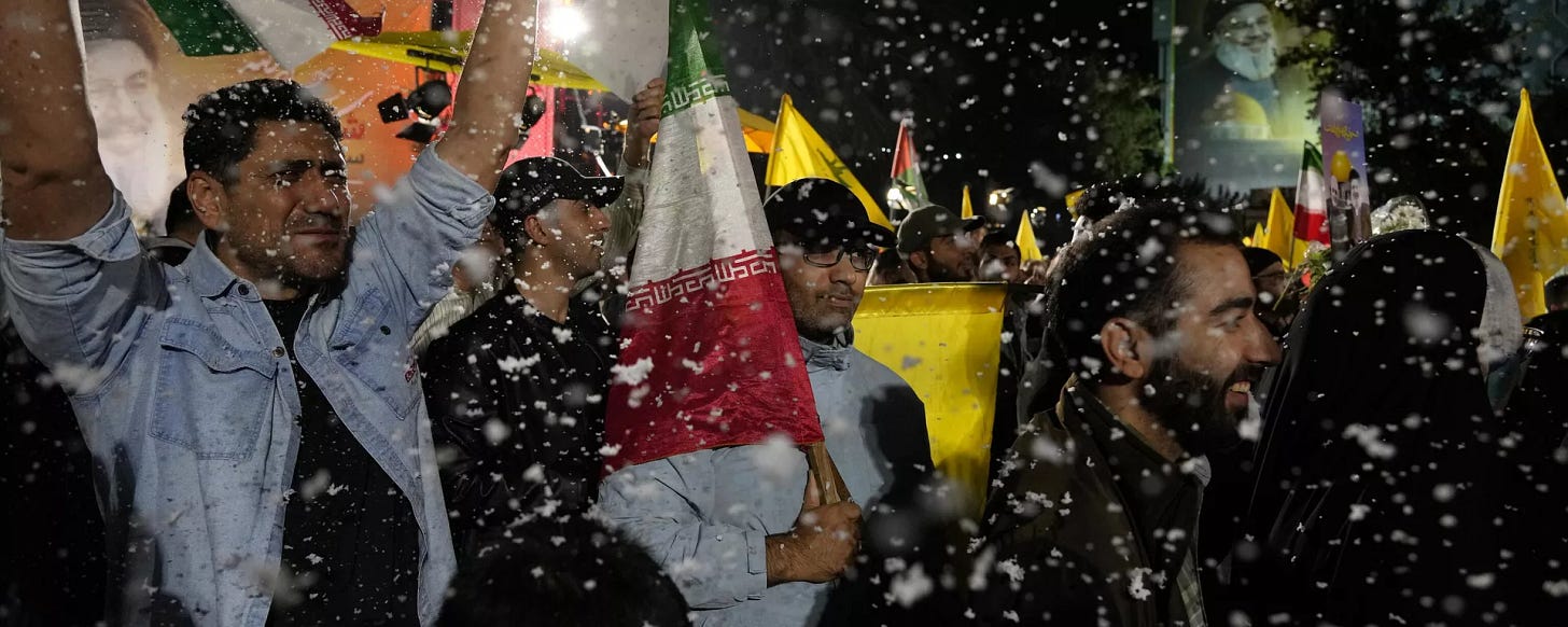 Demonstrators cheer as artificial snow sprayed in an anti-Israeli gathering celebrating Iran's missile strike against Israel, at Felestin (Palestine) Sq. in Tehran, Iran, Tuesday, Oct. 1, 2024 - Sputnik International, 1920, 02.10.2024