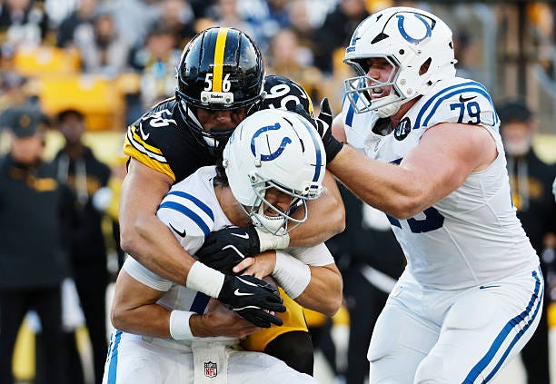 Daniel Jones of the Indianapolis Colts is sacked by Alex Highsmith of the Pittsburgh Steelers during the third quarter of the game at Acrisure... Daniel Jones of the Indianapolis Colts is sacked by Alex Highsmith of the Pittsburgh Steelers during the third quarter of the game at Acrisure...