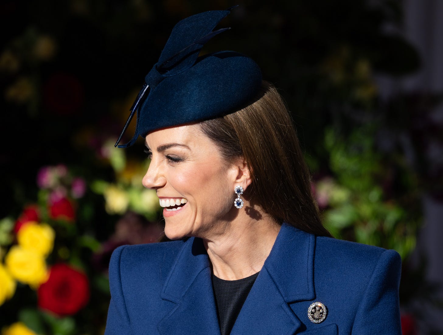 Princess Catherine in a blue coat and hat