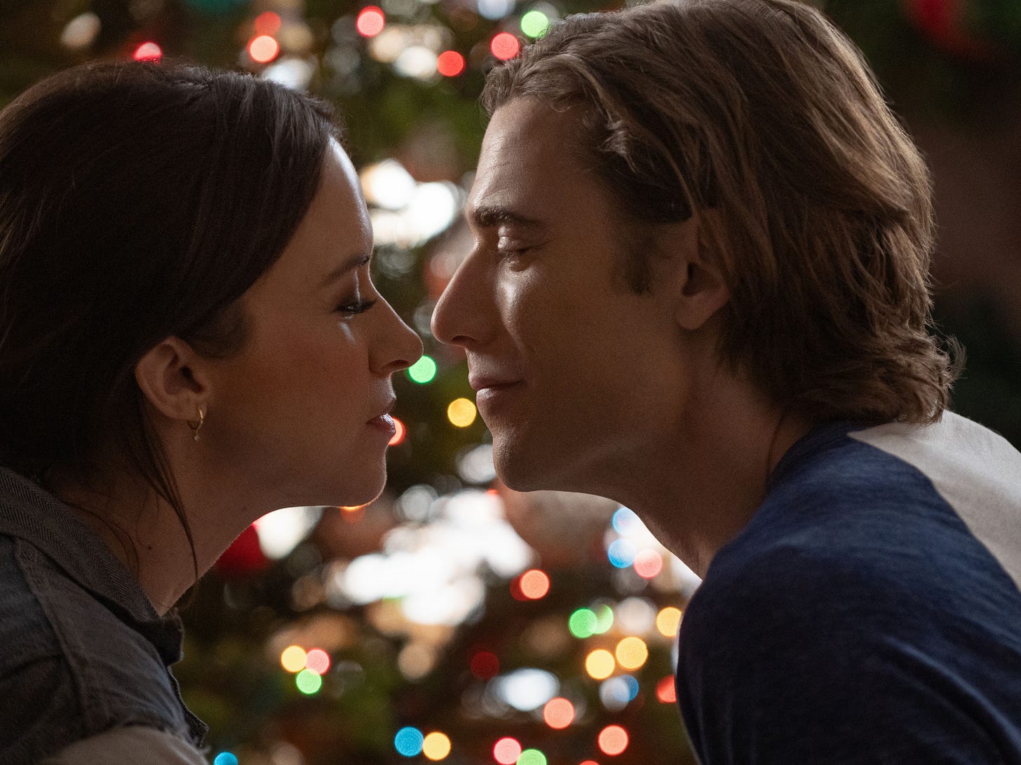 Lacey Shabert and Duustin Milligan face-to-face in 'Hot Frosty.'