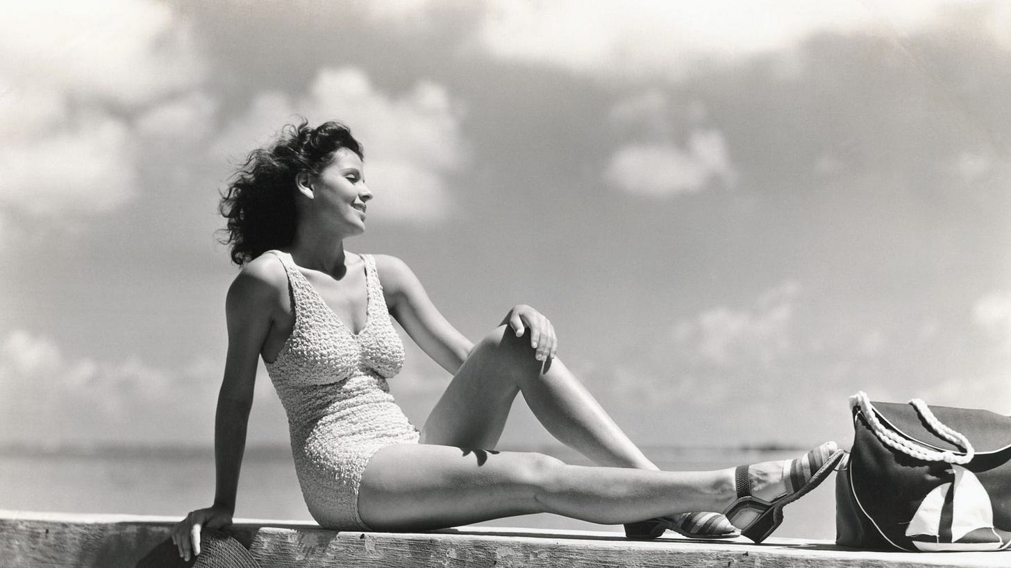 woman one piece protecting skin from sun woman one piece protecting skin from sun