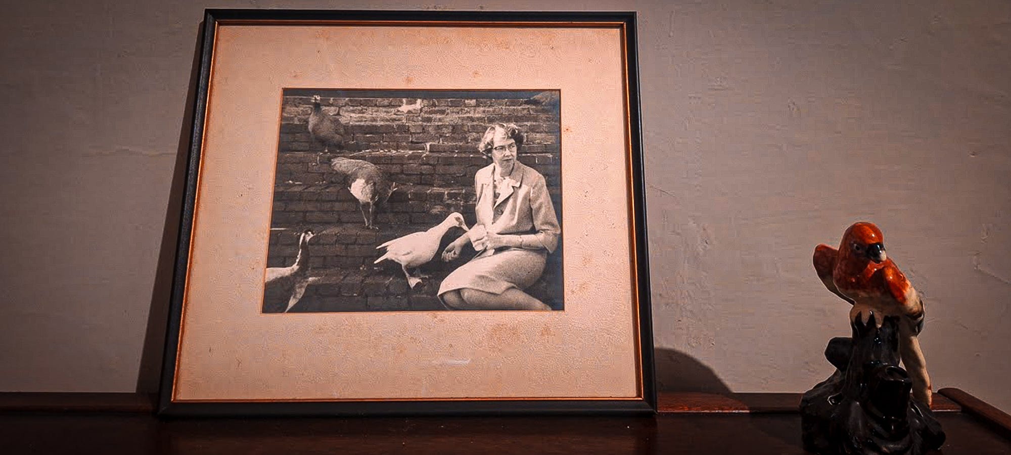 An image of Flannery O’Connor in a room at her house. I had the privilege of visiting in July.