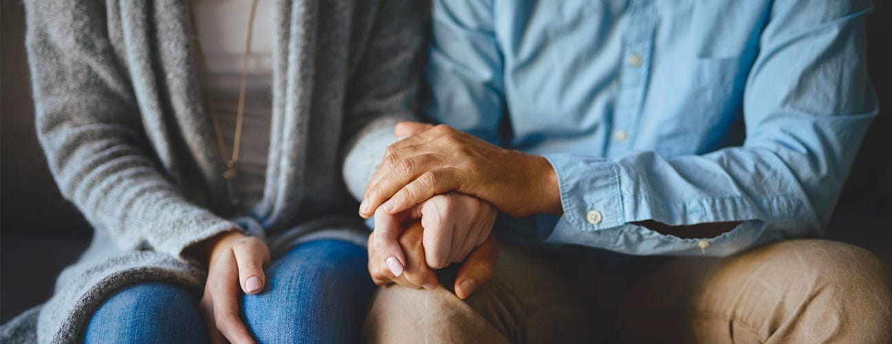 A close-up of a person holding their hands
AI-generated content may be incorrect.