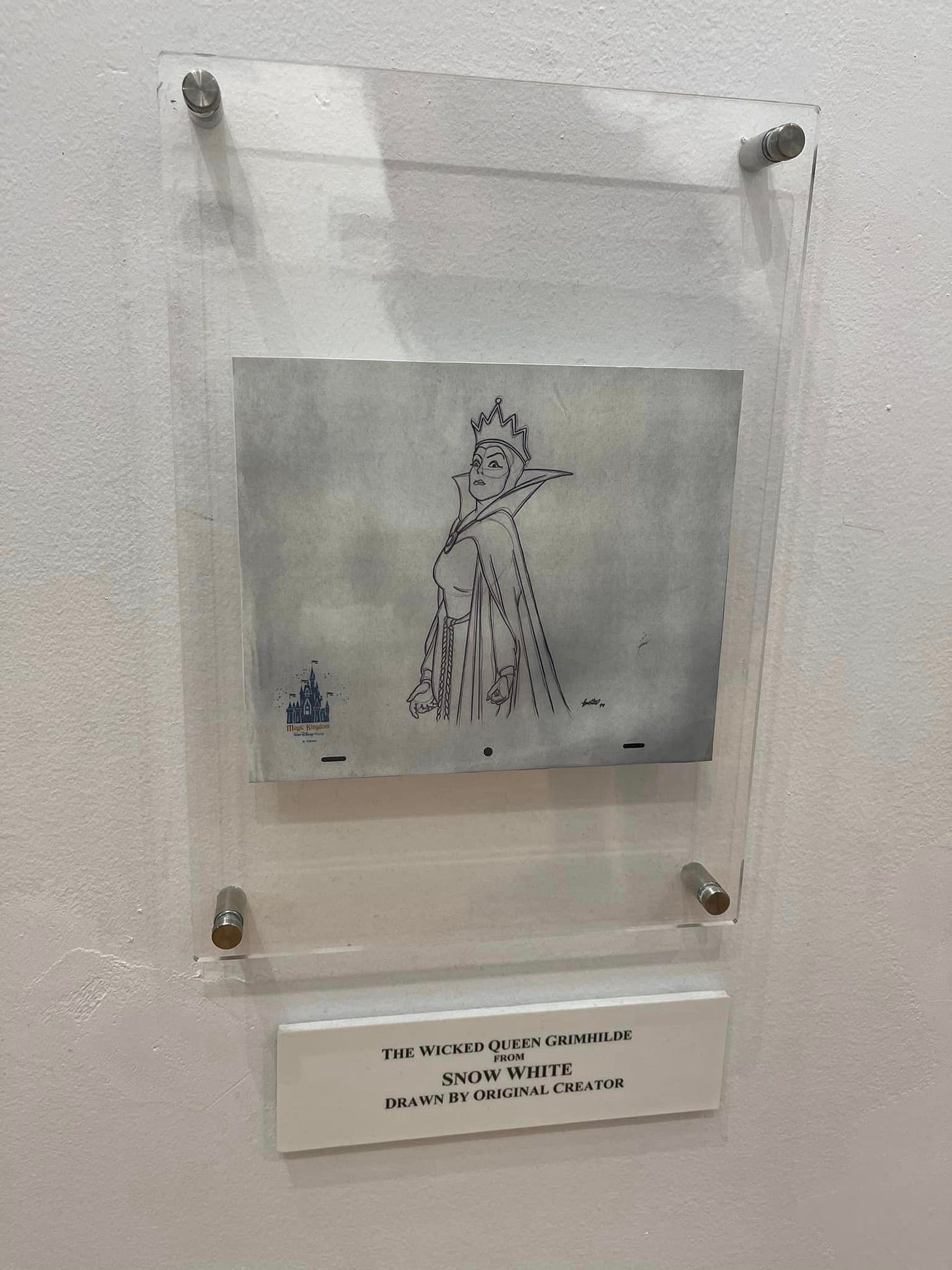 May be art of text that says 'THE WICKED QUEEN GRIMHILDE SNOW WHITE DRA WN ORIGINAL CREATOR'