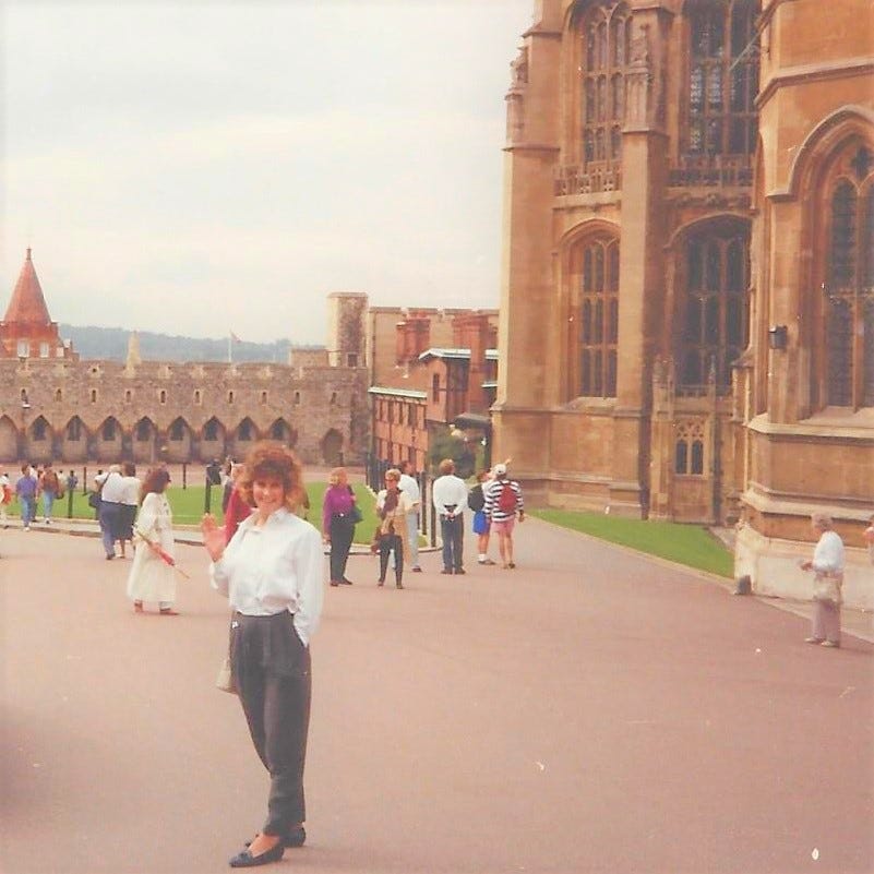 20-something woman stands on the grounds of Windsor Castle 20-something woman stands on the grounds of Windsor Castle