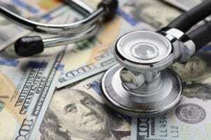 illustration of money and a stethoscope