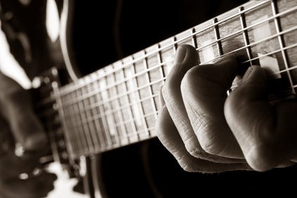 Playing guitar