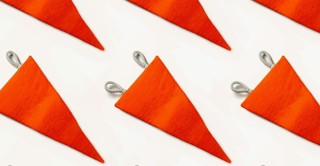 a close up of a bunch of orange triangles