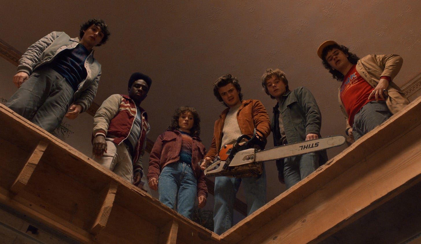 STRANGER THINGS. (L to R) Finn Wolfhard as Mike Wheeler, Caleb McLaughlin as Lucas Sinclair, Natalia Dyer as Nancy Wheeler, Joe Keery as Steve Harrington, Charlie Heaton as Jonathan Byers, and Gaten Matarazzo as Dustin Henderson in STRANGER THINGS. Cr. Courtesy of Netflix © 2025