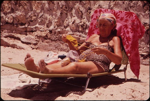 A Member of the South Beach Retirement Community Enjoys the Sun and Sea Air. Most of the Retirees in the Area Live in Inexpensive Residential Hotels Within Walking Distance of the Public Beach. A Member of the South Beach Retirement Community Enjoys the Sun and Sea Air. Most of the Retirees in the Area Live in Inexpensive Residential Hotels Within Walking Distance of the Public Beach.