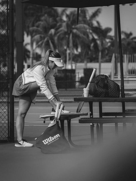A black and white photo series of men and women playing tennis, modeling Miami Racket Club apparel, and chatting courtside. Mix of action shots, posed portraits, and candid moments, showcasing both athleticism and casual club atmosphere.