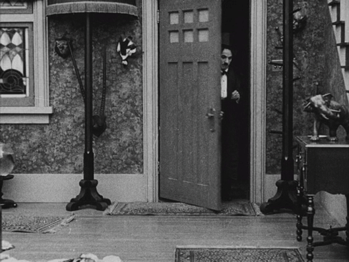 Charlie Chaplin arrives home after a night of drinking in One A.M. (1916) :  r/silentmoviegifs