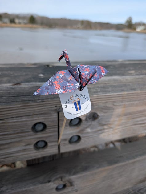 connecting the dots between yoga with Freya and giving away cranes on a stick