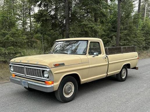 an image of an old, tan pickup truck an image of an old, tan pickup truck