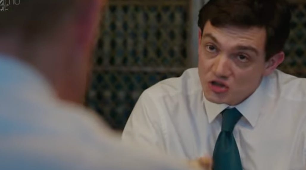 A person in a white shirt and blue tie

AI-generated content may be incorrect.