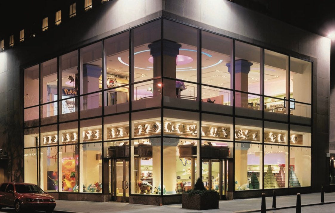 Photograph of the Pokémon Center New York, showing two floors at night.