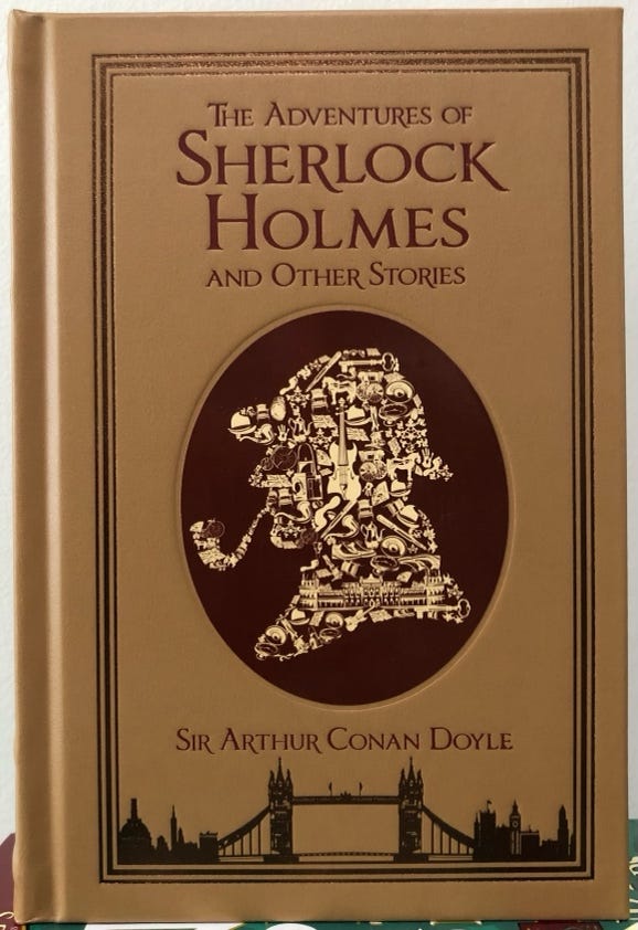 A book with a picture of a sherlock holmes

Description automatically generated