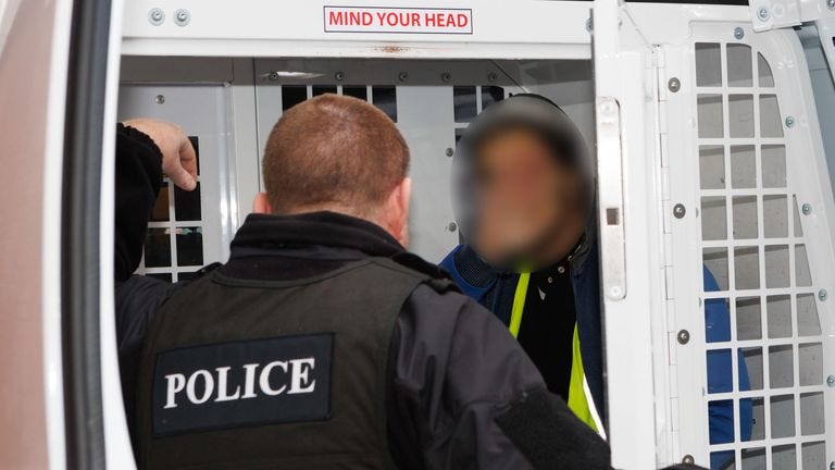 Police executing a warrant in Bradford. Pic: PA
