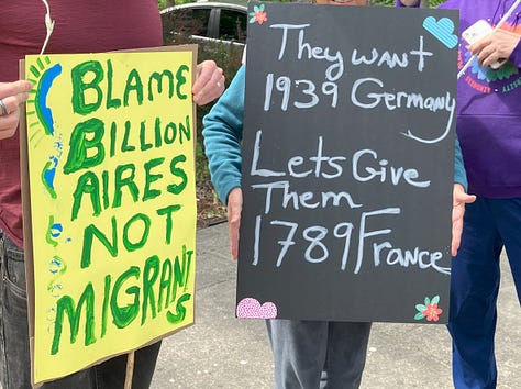 Signs at Bothell No Kings Rally