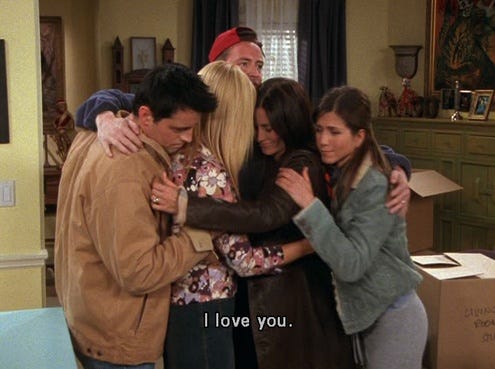 This may contain: the cast of friends hugging each other and saying i love you