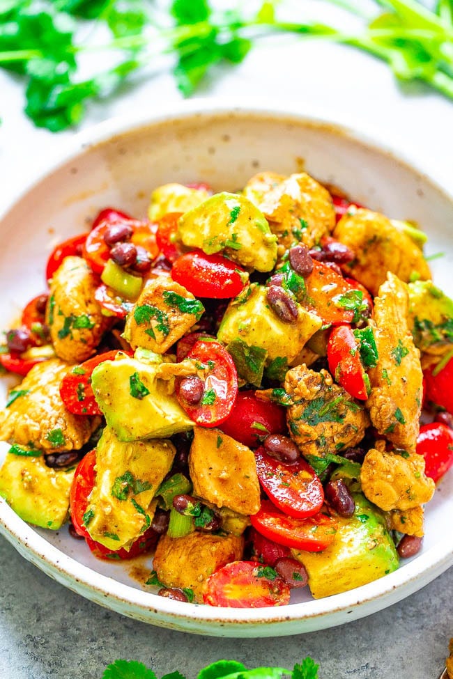 Chicken Avocado Black Bean Salad on white plate. 