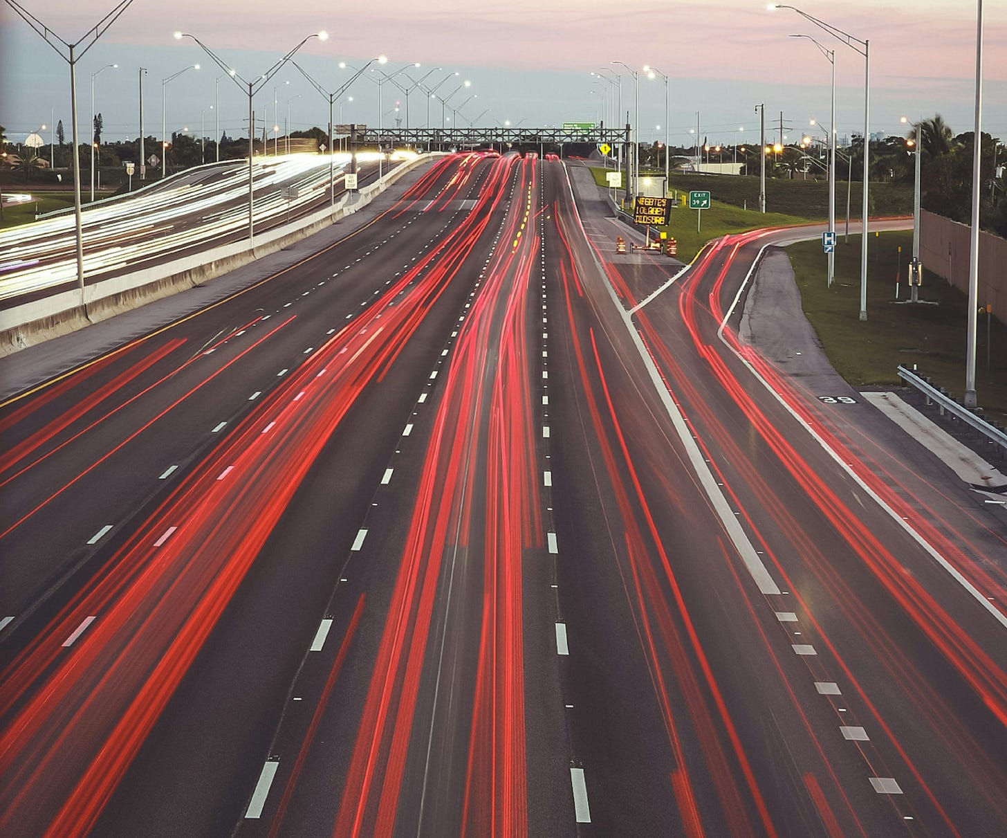 time lapse photography of cars on road during night time time lapse photography of cars on road during night time